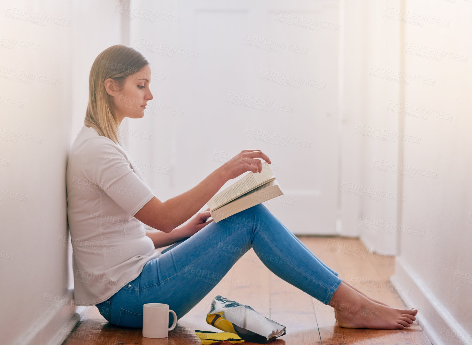 Buy stock photo Woman, home and read novel on floor in the passage for knowledge, information and fantasy. Female person, break and relax on day with book for literature, research and study with chilling and enjoy