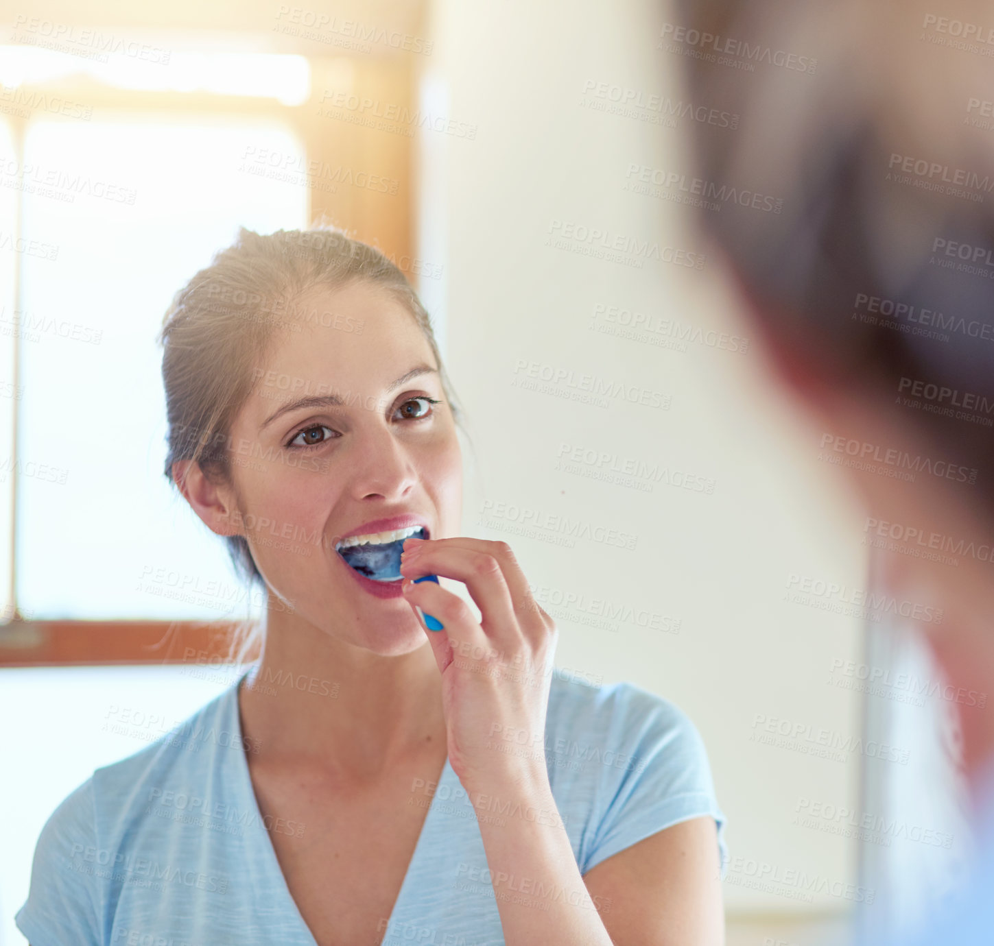 Buy stock photo Woman, toothbrush and teeth in reflection for dental or wellness, morning routine in bathroom for health. Female person, cleaning and mouth for gum hygiene in mirror, results with healthcare