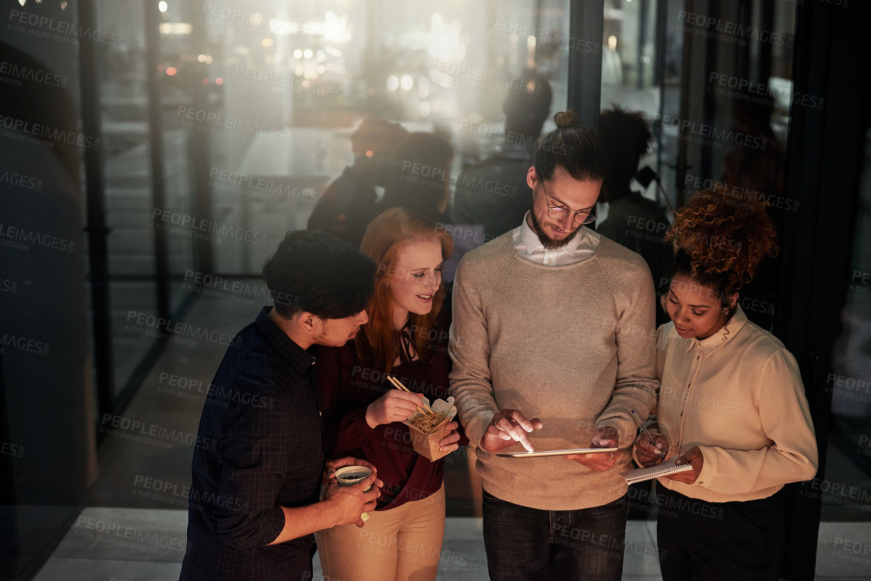 Buy stock photo Team, tablet and office in night for discussion, planning or web design strategy with young business people. Teamwork, it goals and ux designer group for ideas, vision and dark workplace for analysis