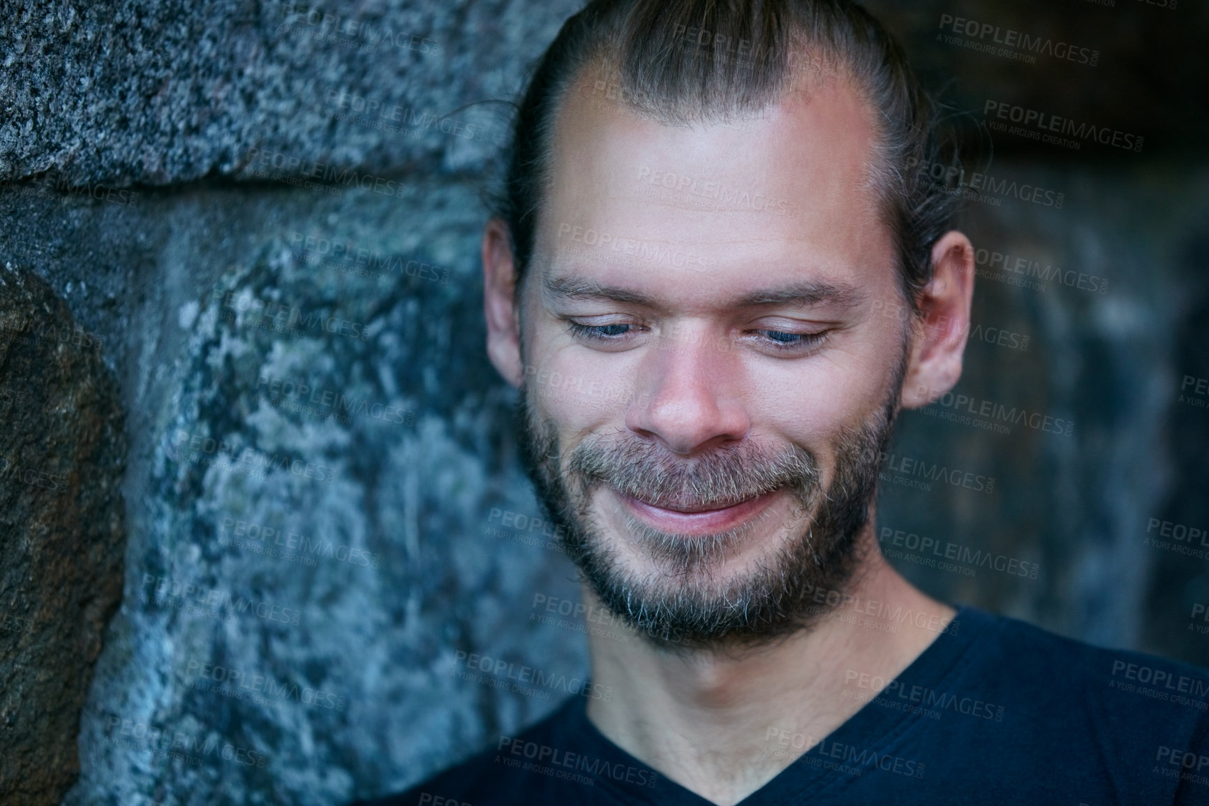 Buy stock photo Thinking, man and wall with smile outdoor for vision, remember decision and nostalgia memory. Happy, male person and ideas with reflection, problem solving and daydreaming with planning for weekend