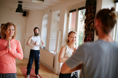 Buy stock photo Cropped shot of a group of people attending a yoga class