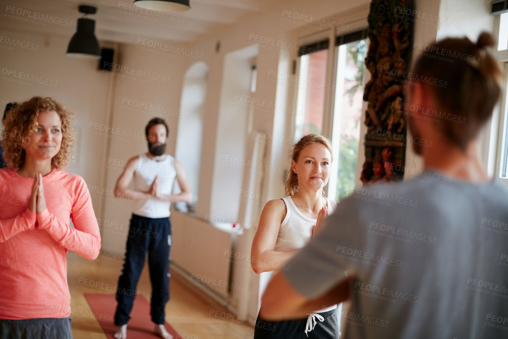 Buy stock photo Cropped shot of a group of people attending a yoga class