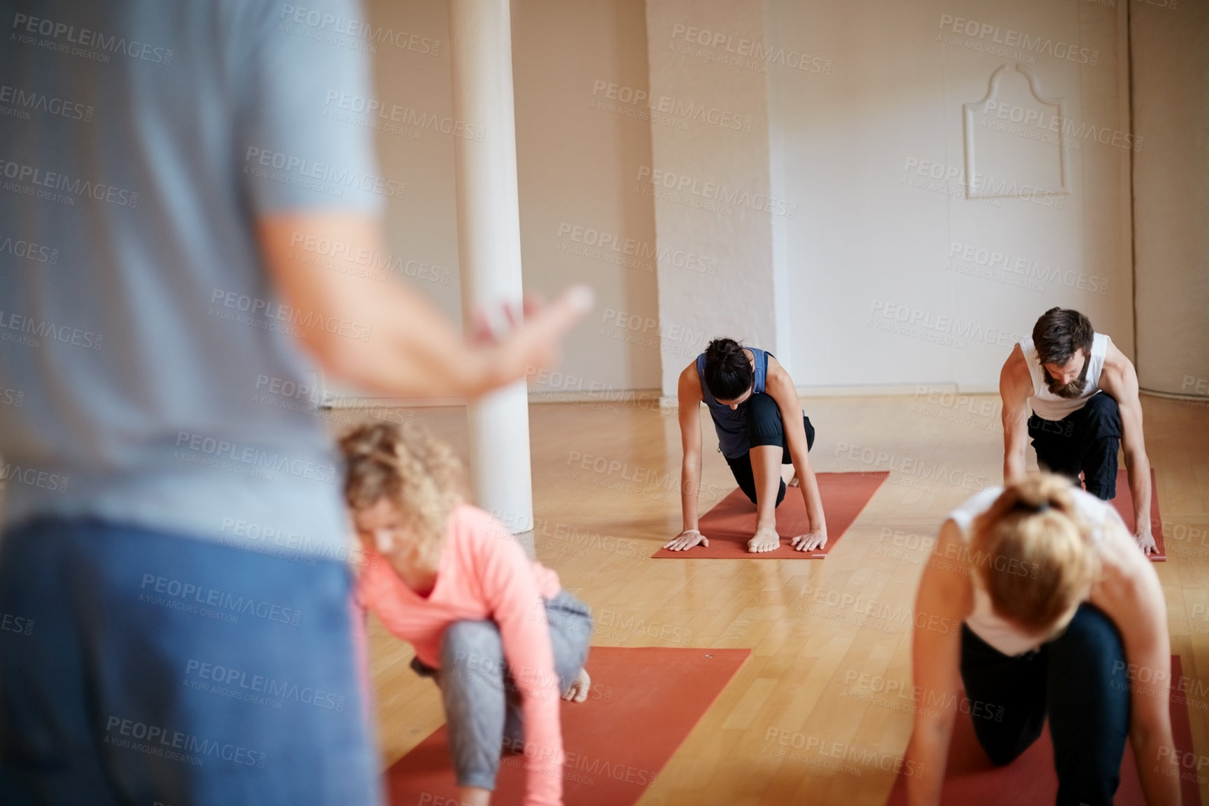 Buy stock photo Cropped shot of a group of people attending a yoga class