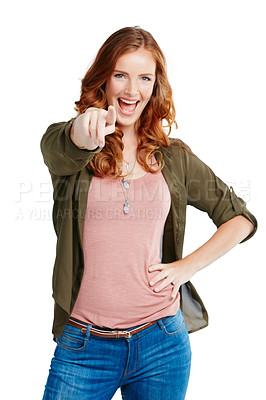 Buy stock photo Studio shot of a young woman pointing against a white background