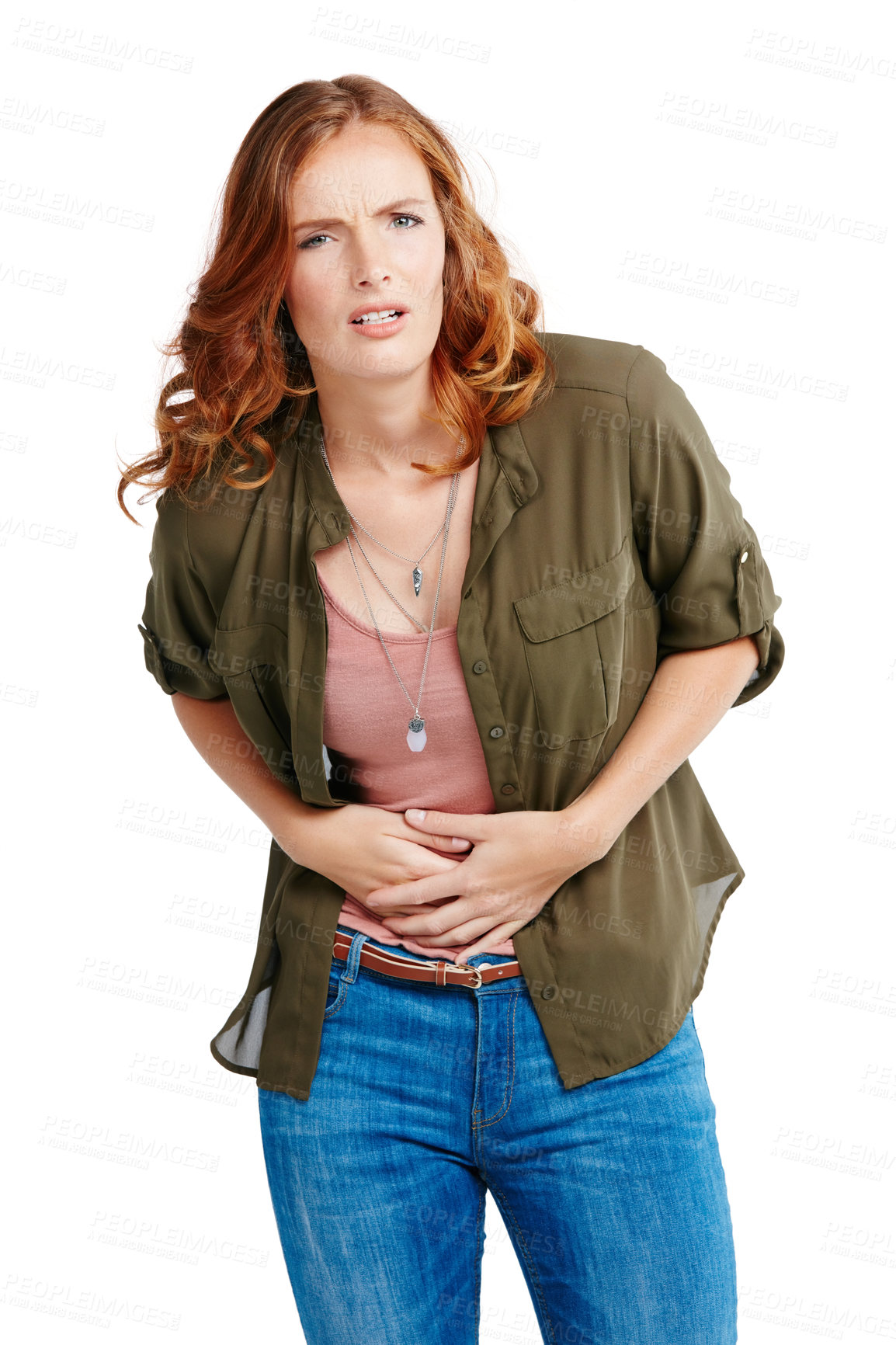 Buy stock photo Studio shot of a young woman experiencing abdominal pain against a white background