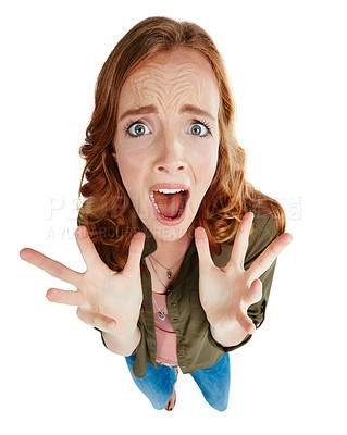Buy stock photo Shot of a young woman looking scared against a white background