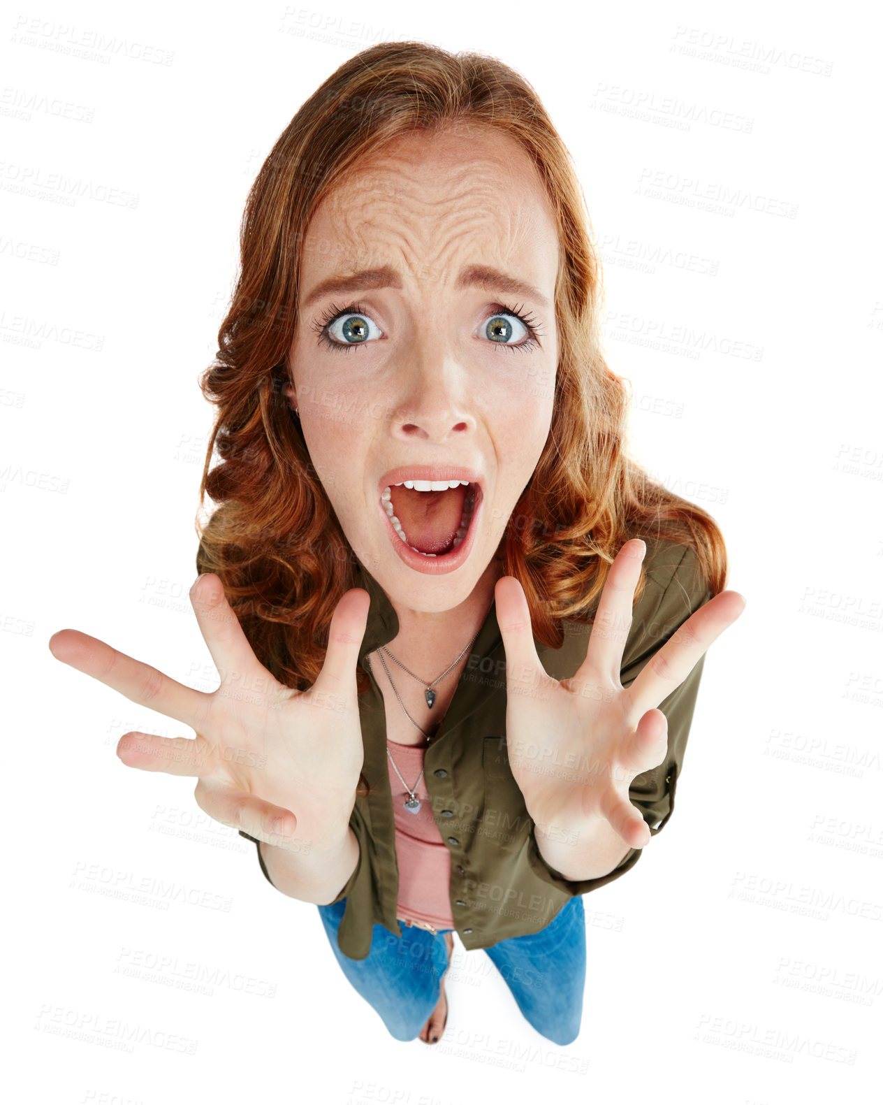 Buy stock photo Shot of a young woman looking scared against a white background