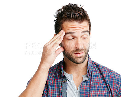 Buy stock photo Studio shot of a young man experiencing a headache