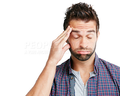 Buy stock photo Studio shot of a young man experiencing a headache