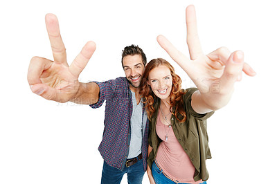 Buy stock photo Shot of a couple posing against a white background