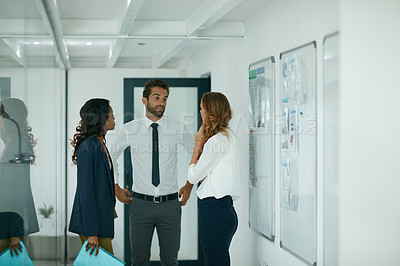 Buy stock photo Cropped shot of colleagues having a discussion in an office