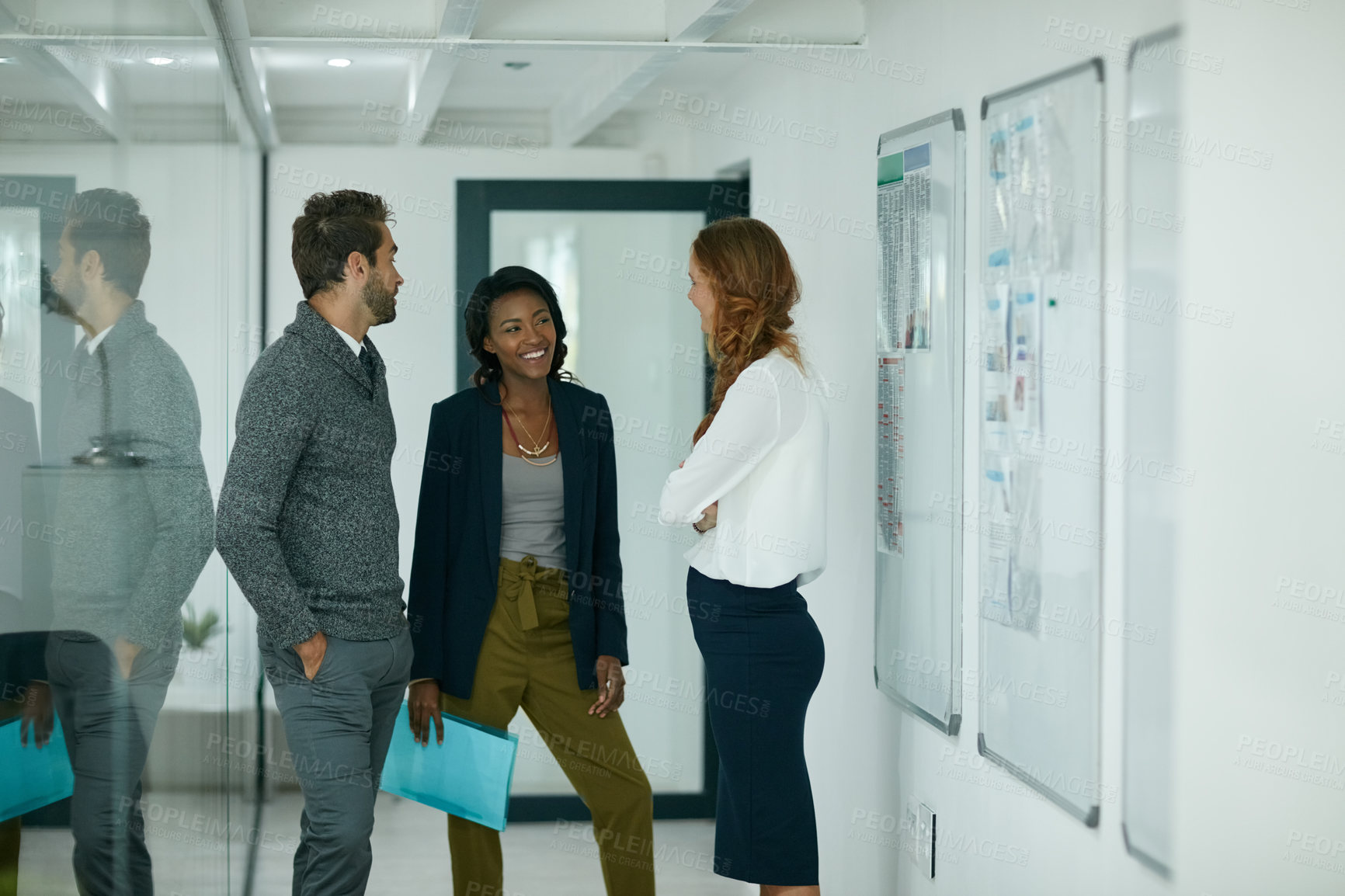 Buy stock photo Cropped shot of colleagues having a discussion in an office