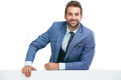 Buy stock photo Studio shot of a handsome businessman leaning against a wall isolated on white