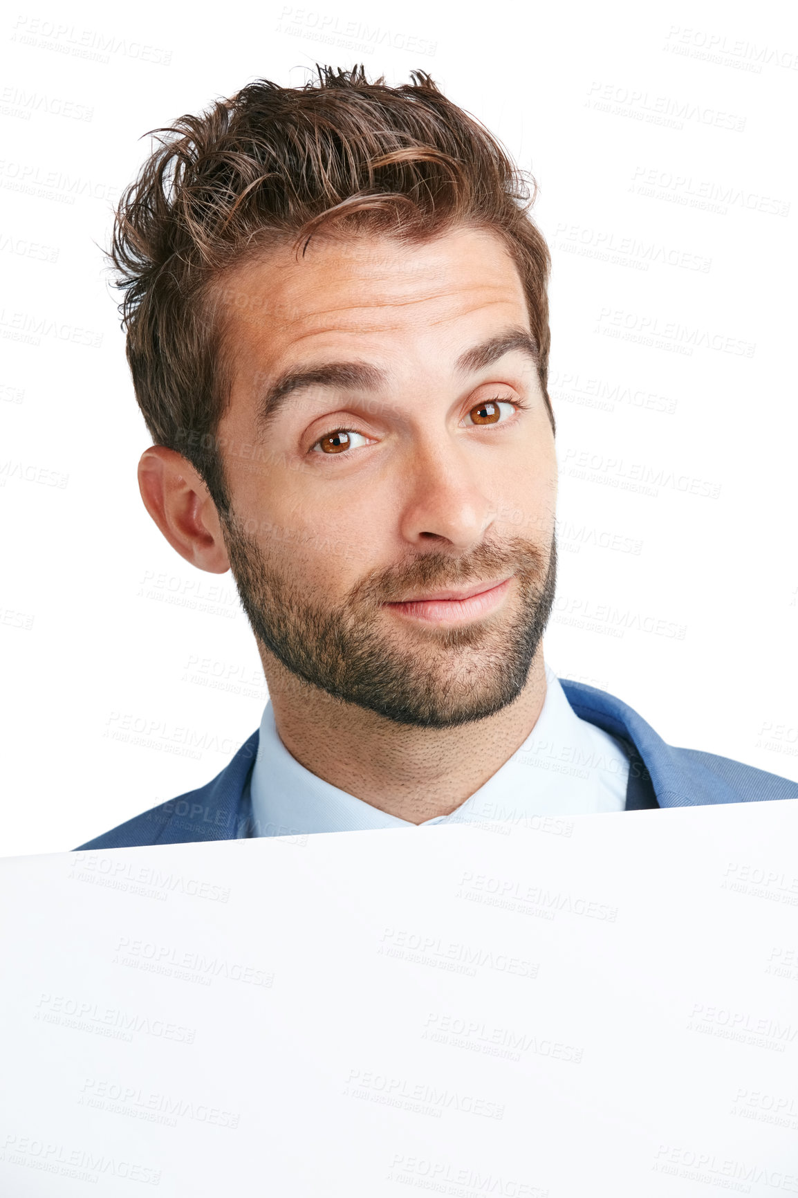 Buy stock photo Studio shot of a handsome man holding up a blank placard against a white background