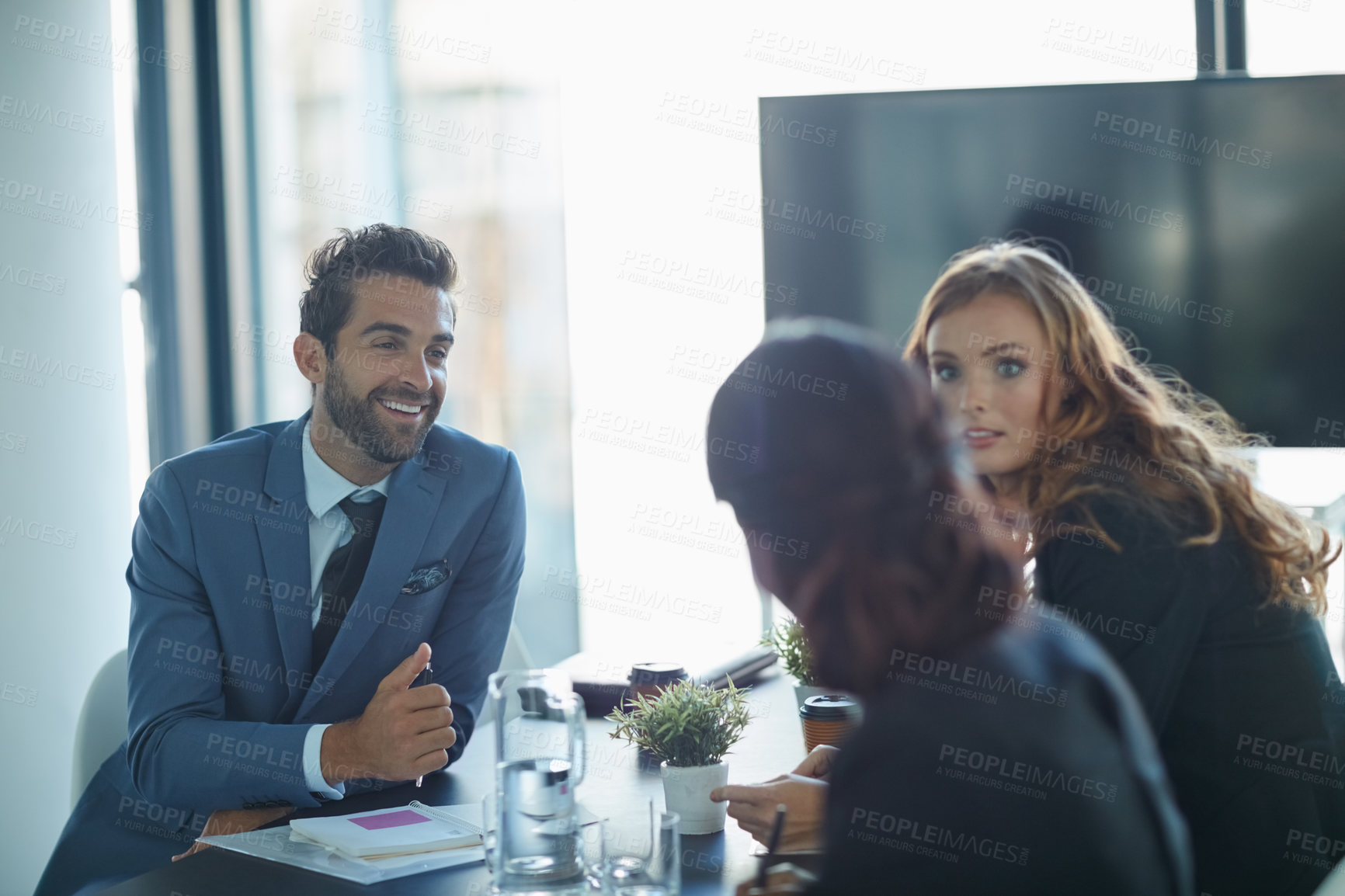 Buy stock photo Cropped shot of businesspeople having a meeting in an office