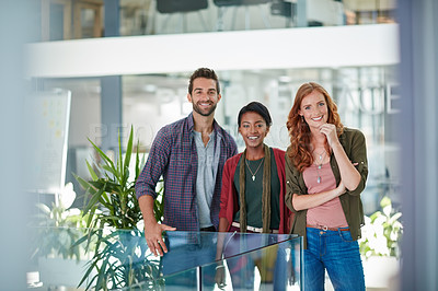 Buy stock photo Portrait of a team of creative businesspeople standing in their office