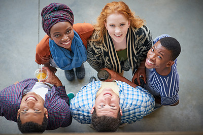 Buy stock photo Portrait of a group of university students standing together on campus