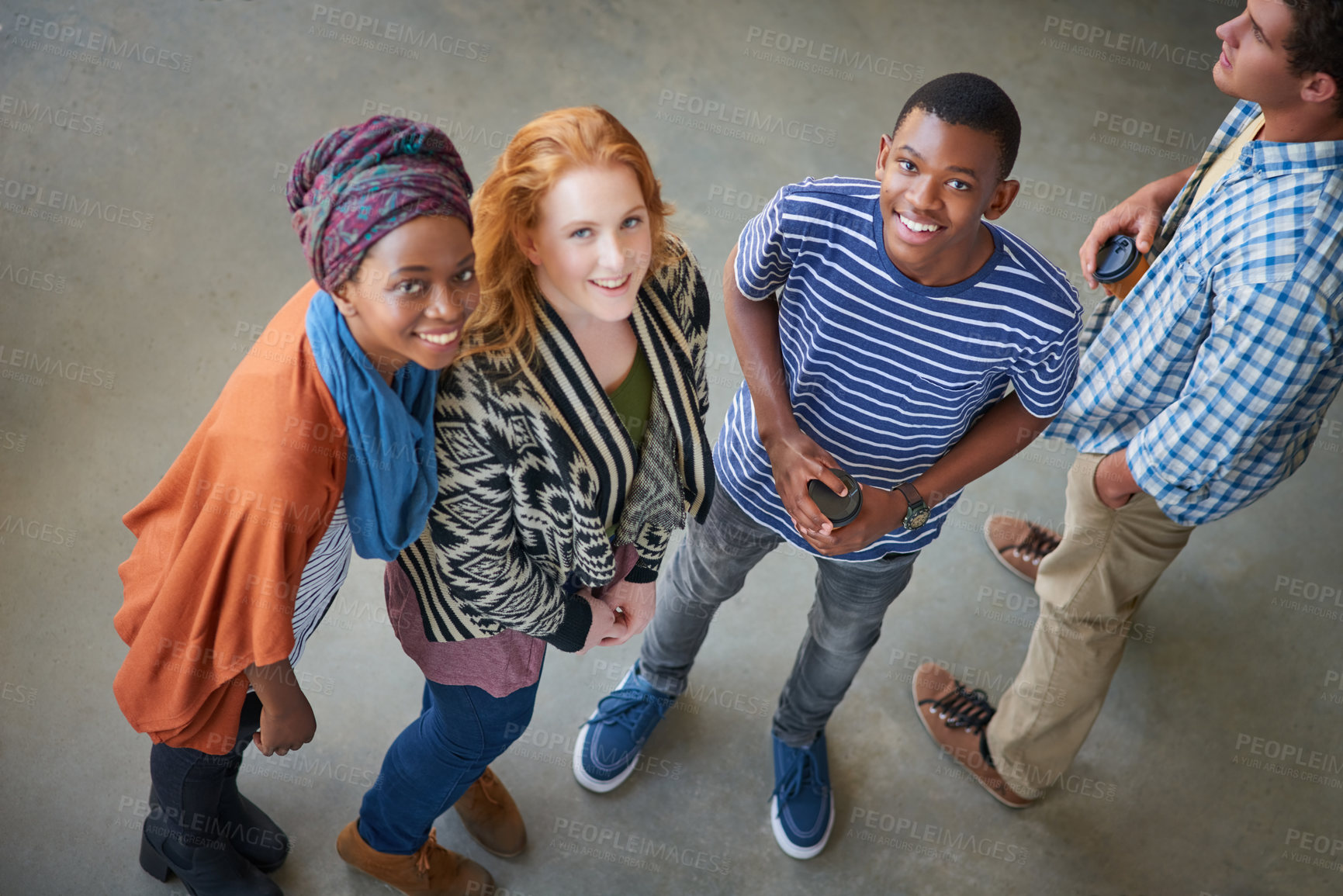 Buy stock photo Portrait of a group of university students standing together on campus