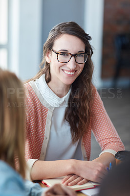 Buy stock photo Portrait of a young university student sitting in her classroom during a group project