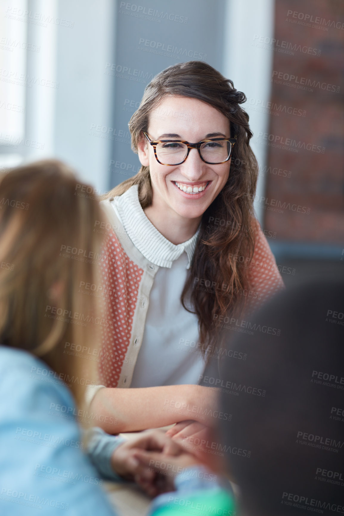 Buy stock photo Portrait of a young university student sitting in her classroom during a group project