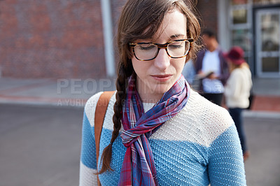 Buy stock photo Cropped shot of a university student on campus