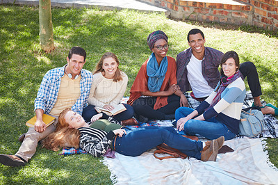 Buy stock photo Portrait of a group of young friends relaxing outside on campus
