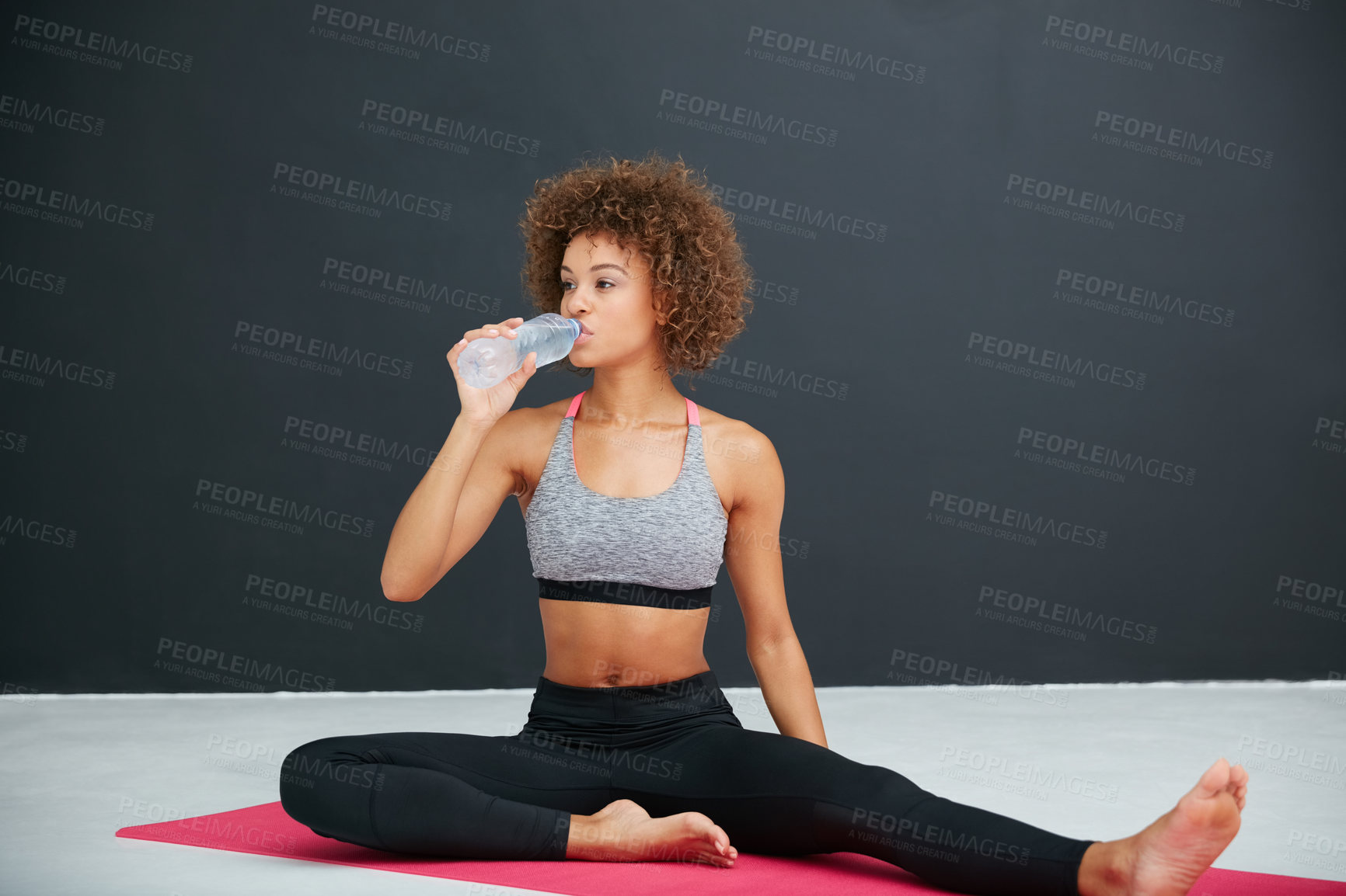 Buy stock photo Fitness, woman and drinking water in gym with bottle, exercise break and electrolytes for hydration. Space, person and wellness in health club with beverage, liquid and workout rest for recovery.