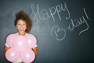 Buy stock photo Black woman, balloons and celebrate happy birthday sign for party fun, happiness and wow celebration. Young african girl, smile and festive balloon, announcement portrait and excited in black studio