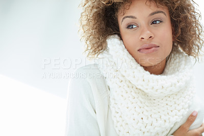 Buy stock photo Shot of an attractive young woman dressed in winter attire