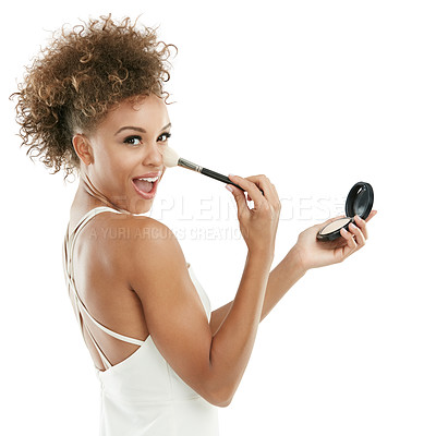 Buy stock photo Studio shot of an attractive young woman applying makeup to her face against a white background