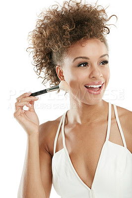 Buy stock photo Studio shot of an attractive young woman applying makeup to her face against a white background