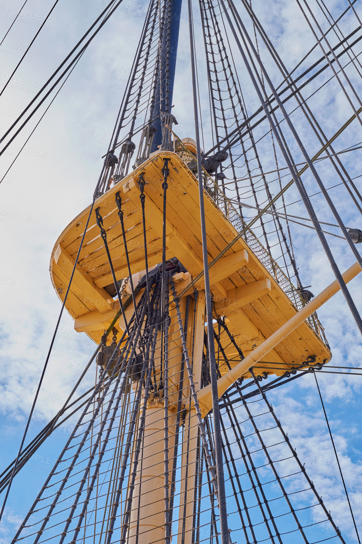 Buy stock photo Blue sky, history and journey with mast of ship outdoor in nature from below for Danish heritage. Engineering, rope and travel with flagpole on sail boat for adventure, holiday or vacation at sea