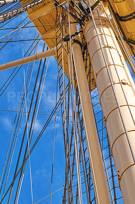 Buy stock photo Below, blue sky and travel with mast of ship outdoor in nature for historical Danish heritage. Adventure, engineering and rope with wooden sail boat for holiday, transportation or vacation at sea