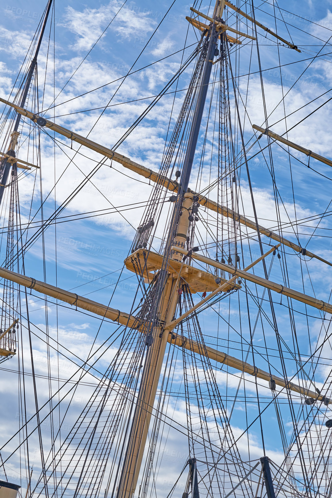 Buy stock photo Adventure, blue sky and travel with mast of ship outdoor in nature from below for Danish heritage. Engineering, history and rope with flagpole on sail boat for journey, holiday or vacation at sea