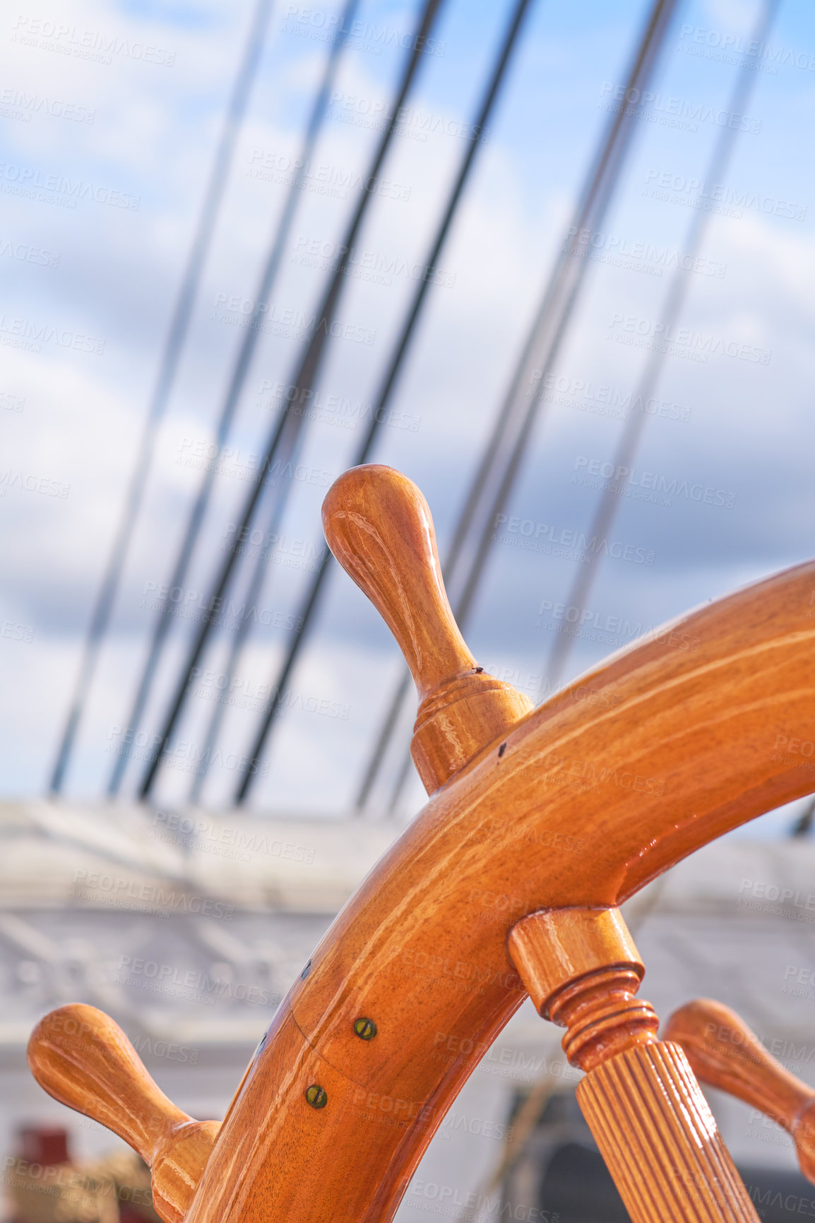 Buy stock photo Wood, ship and vintage steering wheel closeup for sailing, travel and navigation or control direction. Boat, helm and old transport for cruise, history and voyage for journey on deck for vacation