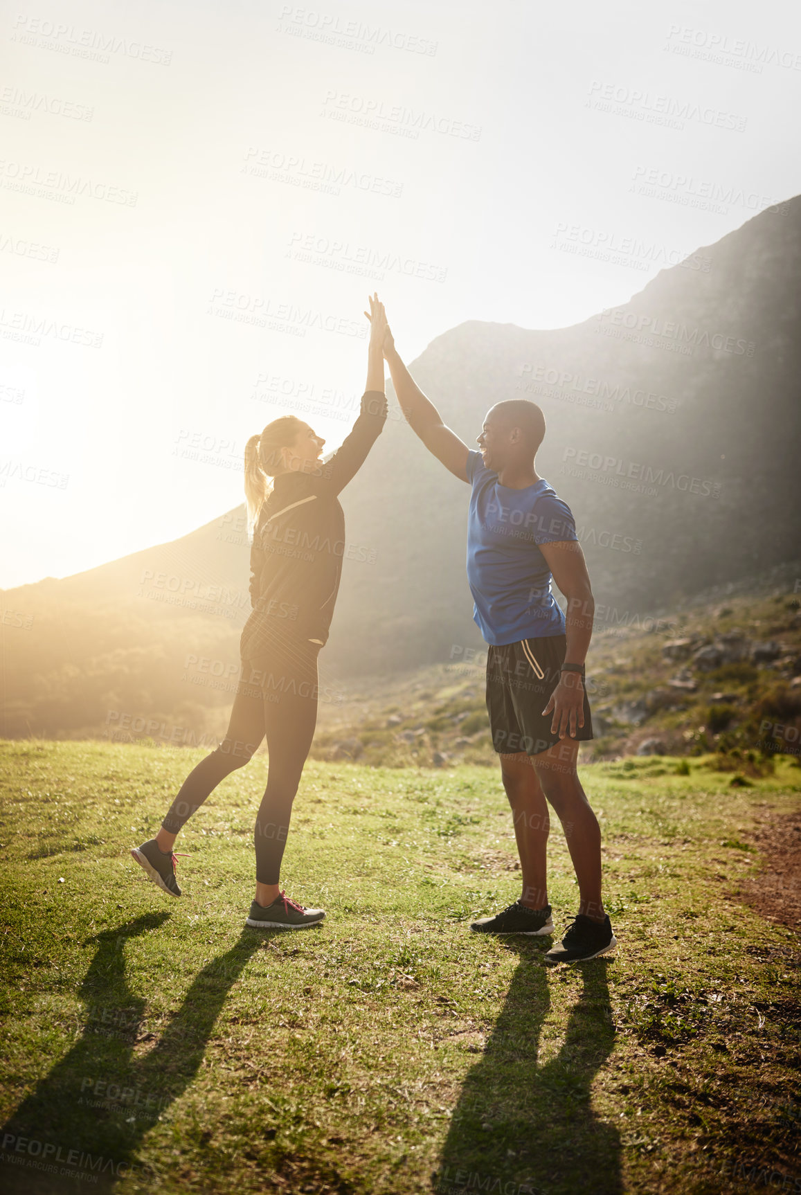 Buy stock photo Nature, fitness and people with high five for running with trail planning for marathon training. Sports, celebrate and couple of athletes preparing outdoor on mountain for cardio workout or exercise.