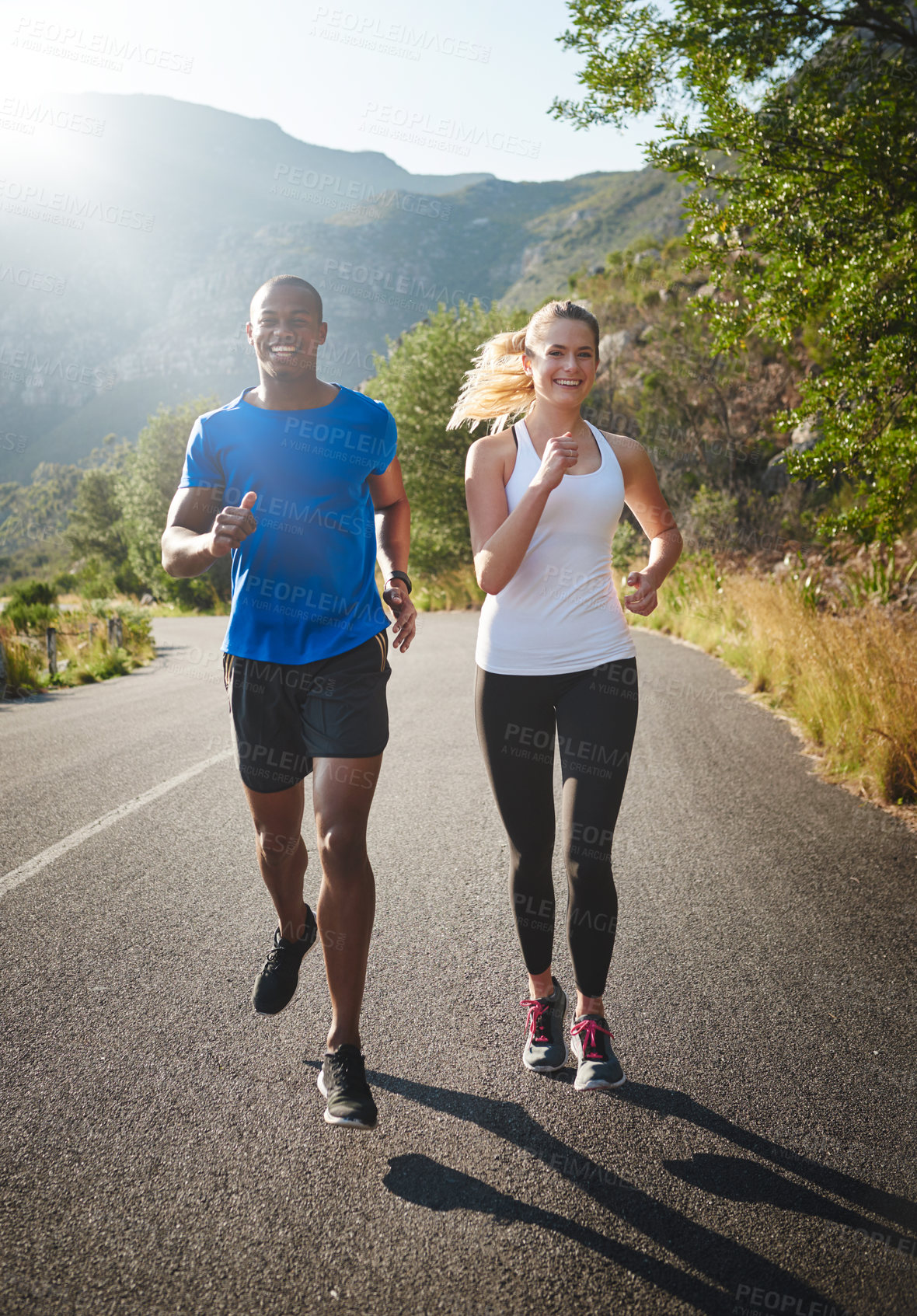 Buy stock photo Couple, running and portrait with exercise in nature for wellness, support or cardio in fitness training. Sports, athlete and runner with marathon by road for endurance, challenge or workout together