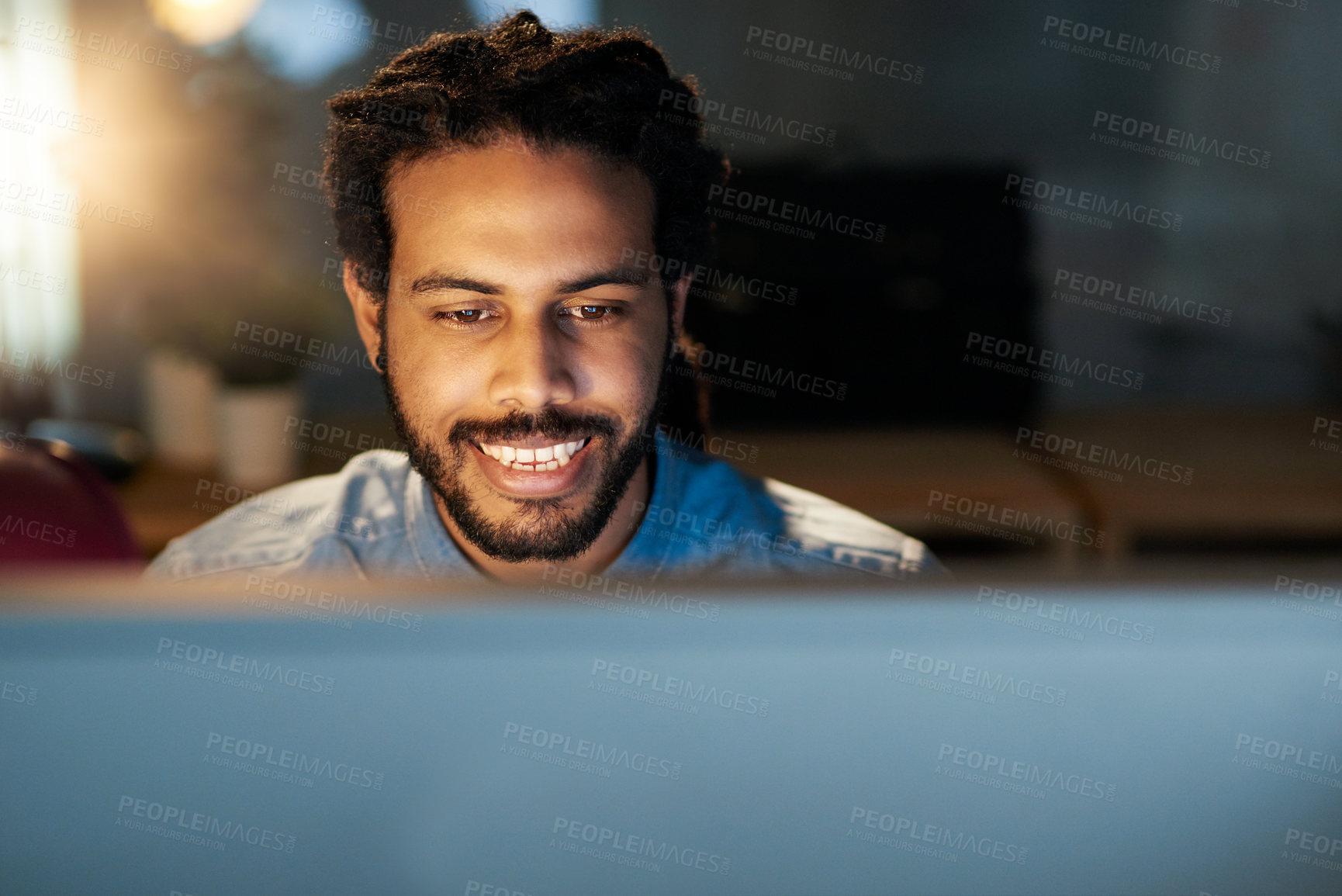 Buy stock photo African man, laptop and happy for research, communication or project management in office at night. Web designer, tech and deadline for target audience, graphic and multimedia with ui, ux or branding