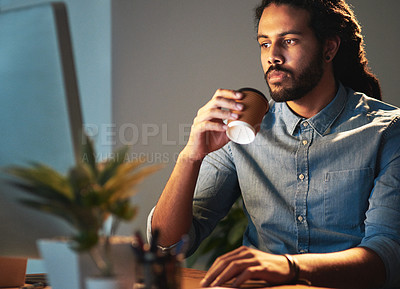 Buy stock photo Cropped shot of a young designer working late in an office