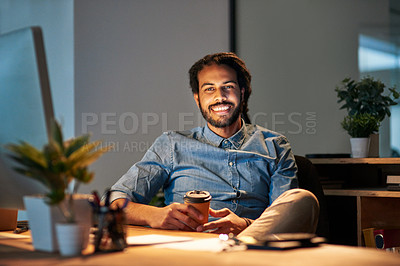 Buy stock photo Portrait of a young designer working late in an office