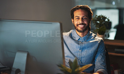 Buy stock photo Portrait of a young designer working late in an office