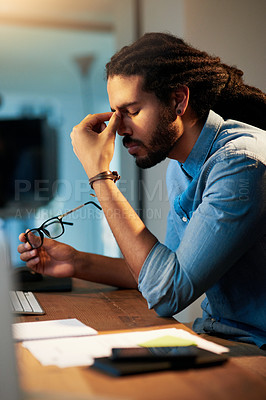 Buy stock photo Frustrated man, headache and night with stress for deadline, pressure or bankruptcy at office. Businessman, employee or designer working late with pain, strain or anxiety for debt or financial crisis