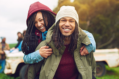 Buy stock photo Portrait of a happy young couple enjoying the winter weather outside