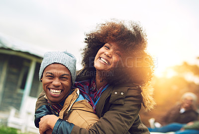 Buy stock photo Portrait of a happy young couple enjoying the winter weather outside