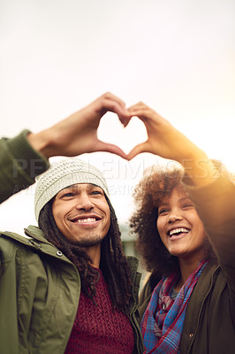 Buy stock photo Heart hands, outdoor and couple with support, happiness and travel with kindness, icon and bonding together. People, outside and adventure with gesture, symbol for love and smile with sign and emoji