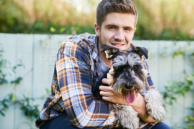 Buy stock photo Happy, man and portrait bonding with dog in garden, playing and showing affection for his puppy at home. Cheerful, loving and male enjoying time with pet on lawn, playful together with hug or embrace