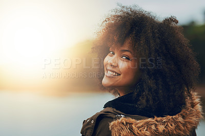 Buy stock photo Woman, outdoor and portrait on holiday by lake, afro and travel for vacation, nature and mock up space in sky. Girl, person and happy with view of river, water and lens flare on adventure in Brazil