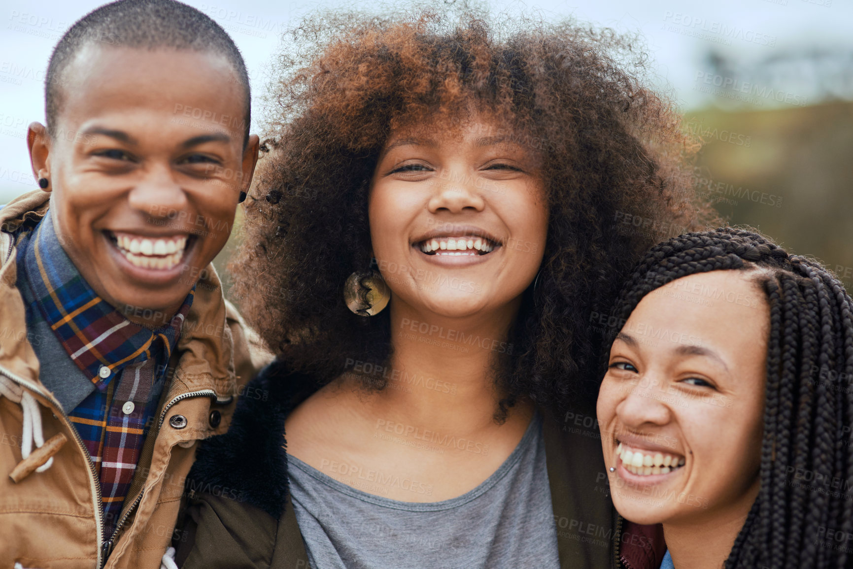 Buy stock photo Portrait of a group of happy friends posing together outside