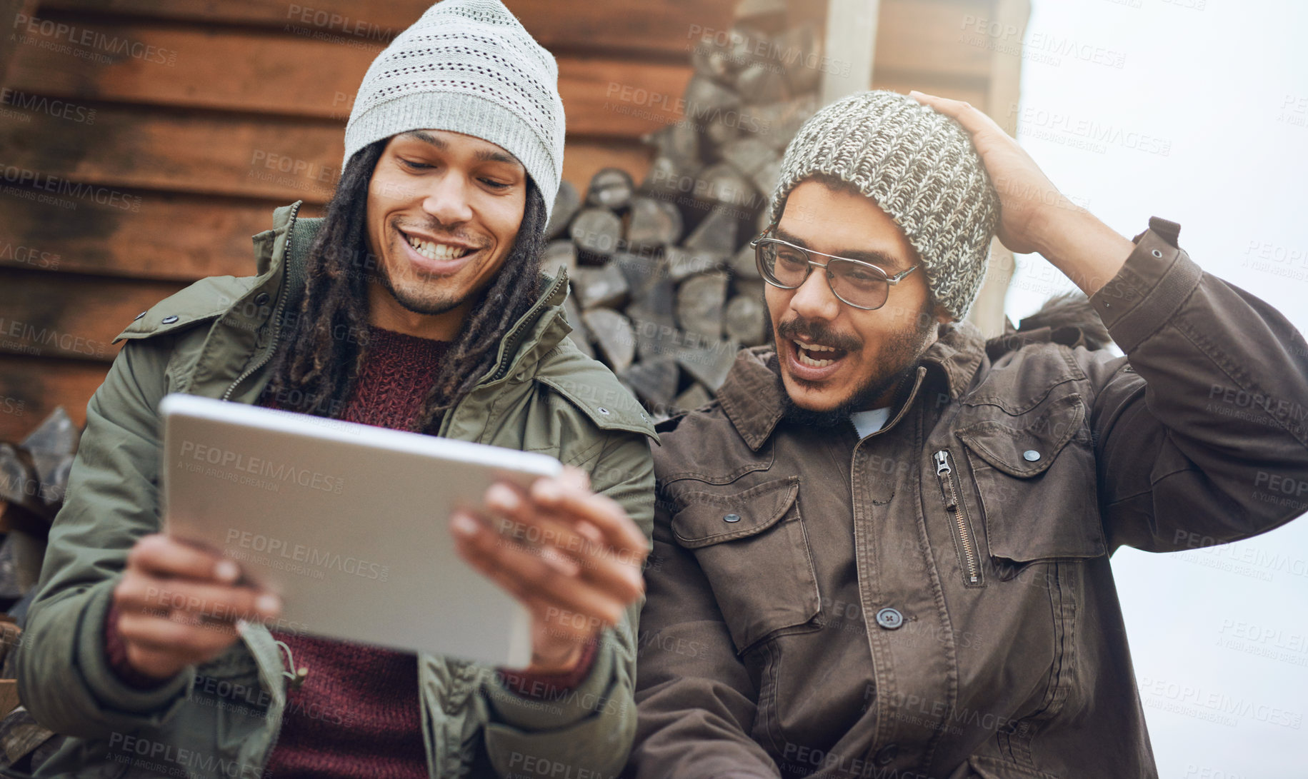 Buy stock photo Happy men, camping and browsing with tablet on patio in nature for connectivity, signal or online streaming. Male people, relax or campers with technology for entertainment or app at holiday house