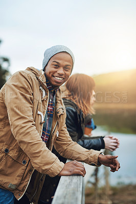 Buy stock photo Shot of a young man spending time outdoors on a weekend getaway
